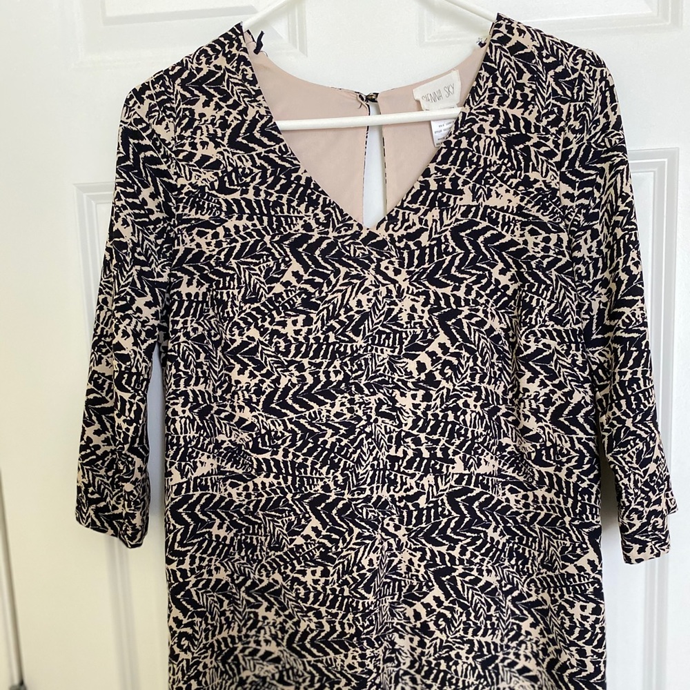 Very cute black and creme dress! Never worn.